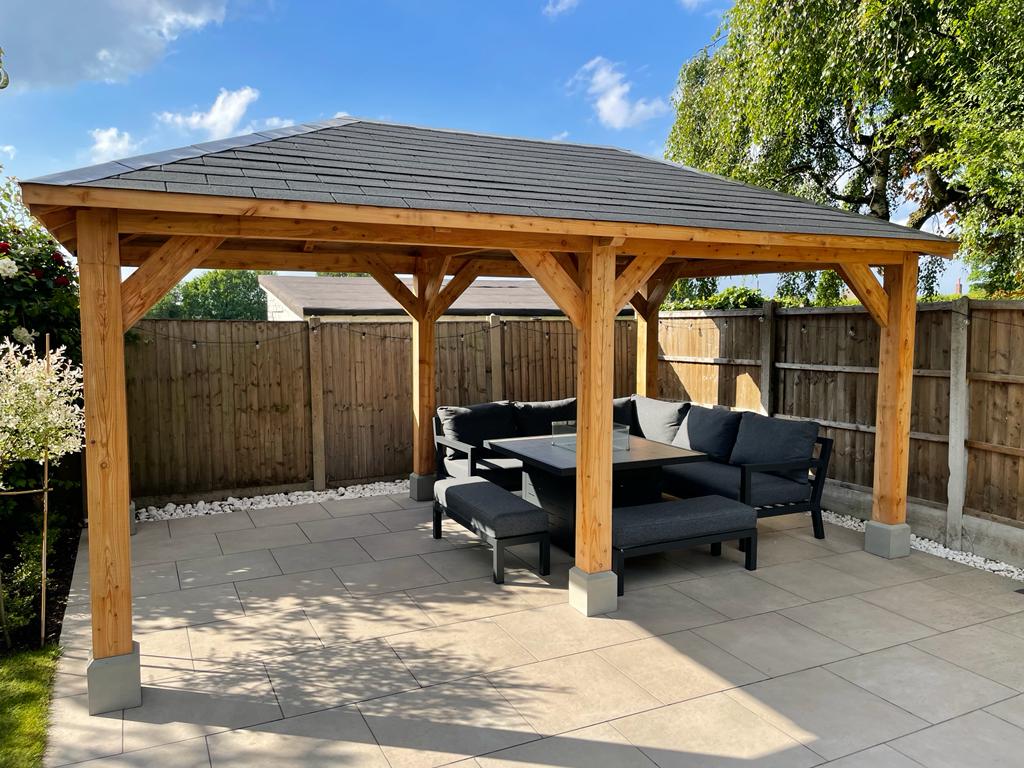 Chunky and large gazebo with 6 posts over a patio